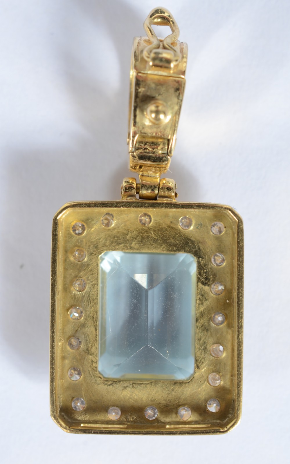 Pendente de ouro 18 k., contraste 750 mls com pedra água marinha... - foto 2 de 3
