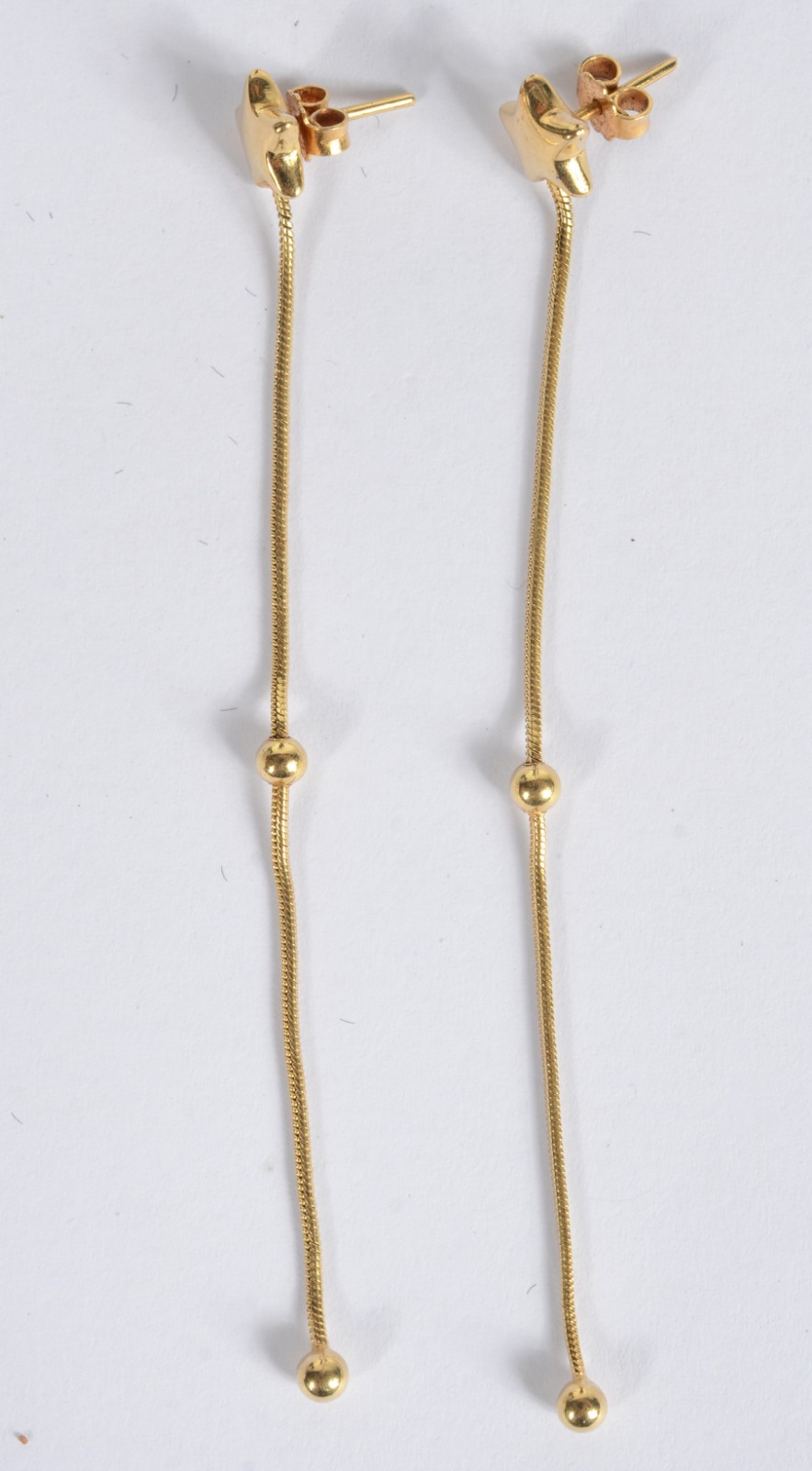 Par de brincos na forma de estrela com esferas de ouro 18 k... - foto 2 de 4