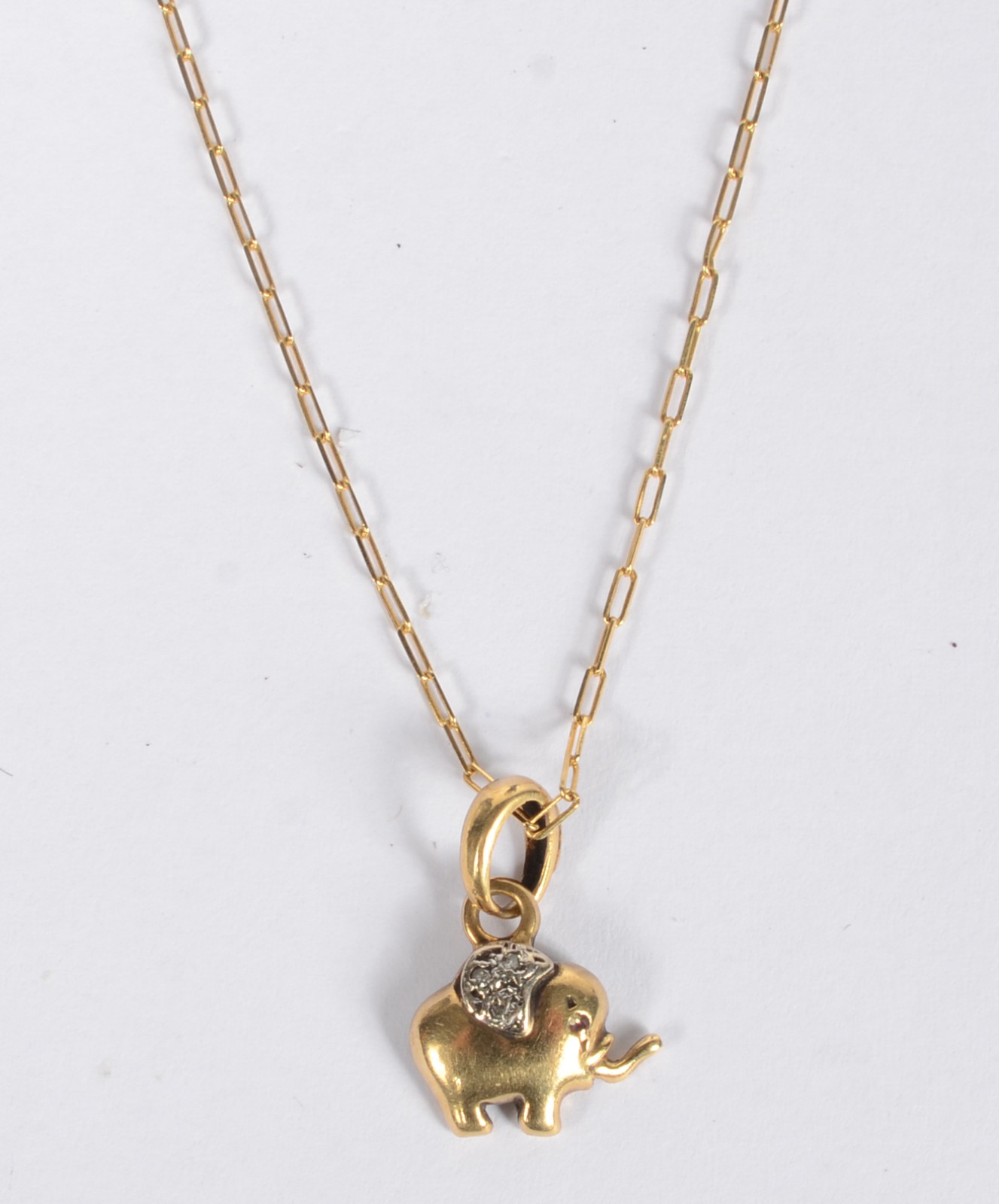Colar com pendente na forma de elefante de ouro 18 k. (Por motivos de... - foto 1 de 6
