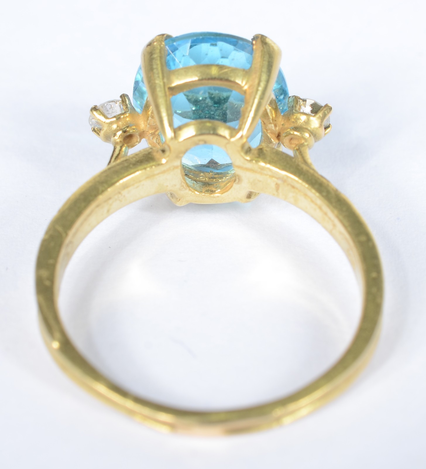 Anel de ouro 18 k., contraste 750 mls com pedra topázio azul e... - foto 3 de 6
