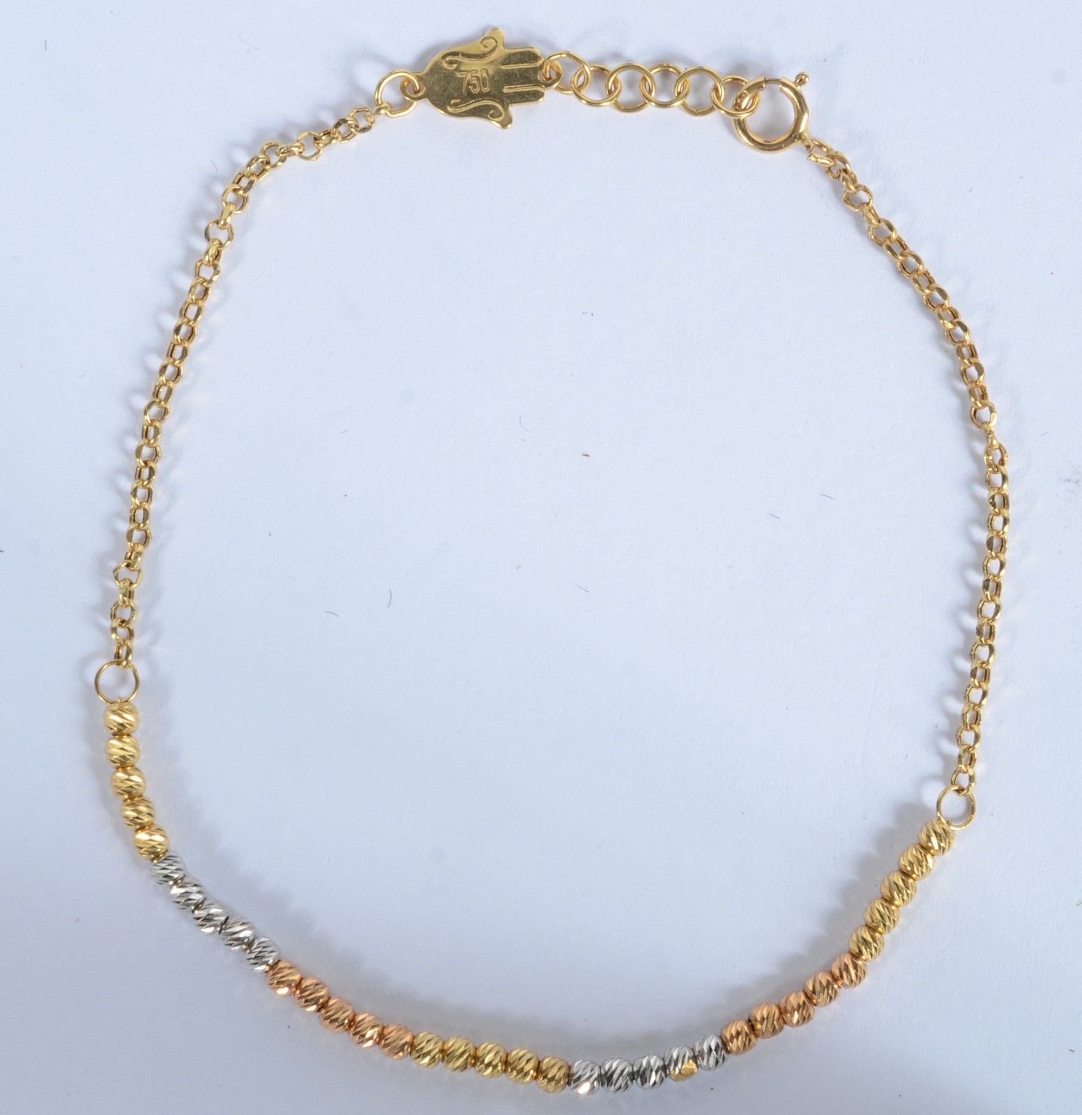 Pulseira de ouro 18 k., contraste 750 mls, bolinhas em três tons... - foto 1 de 3