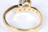 Anel de ouro 18 k., contraste 750 mls com cinco... - Anel de ouro 18 k., contraste 750 mls com cinco brilhantes laterais e um brilhante central de 0,5 ct. Aro 18/19.  (Por motivos de segurança a pe...