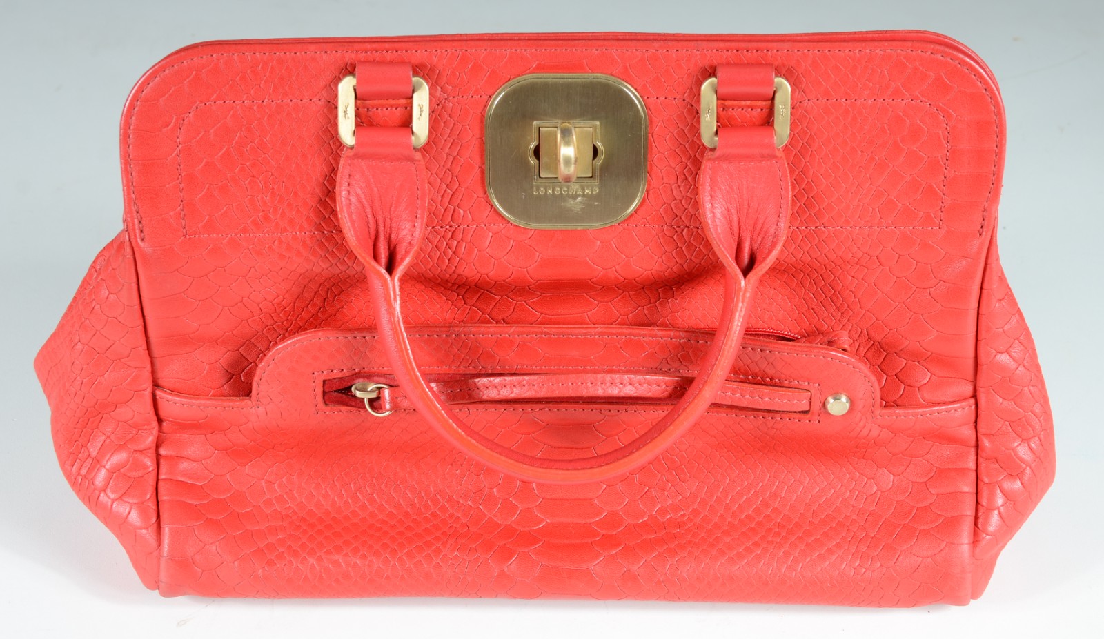 Bolsa feminina de couro vermelho, ferragens douradas, alça tiracolo... - foto 1 de 5