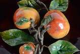 Grande prato de cerâmica portuguesa  decorada c... - Grande prato de cerâmica portuguesa  decorada com frutos em relevo e policromia.