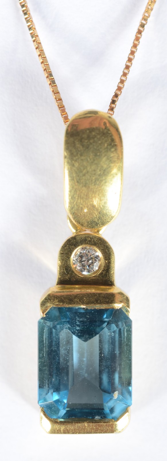 Colar de ouro 18 k., contraste 750 mls com pendente com pedra topázio... - foto 1 de 4