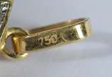 Pendente na forma de cruz com brilhantes e resp... - Pendente na forma de cruz com brilhantes e resplendor de ouro 18 k. (Por motivos de segurança a peça não se encontra na loja).