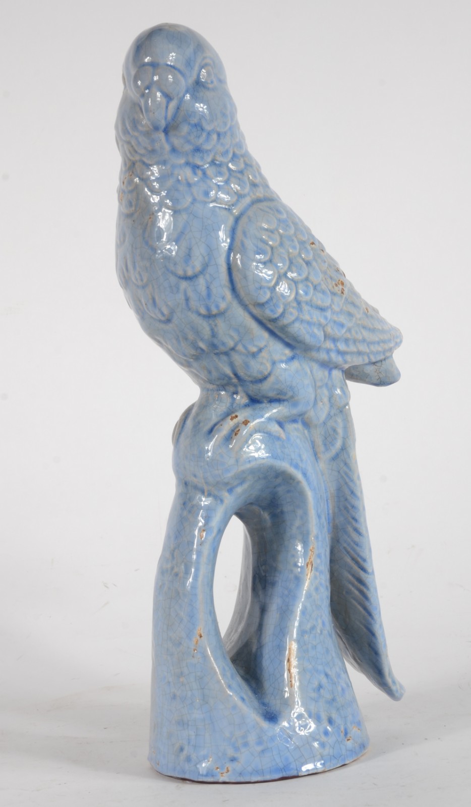Escultura de cerâmica azul representando papagaio. - foto 1 de 10