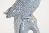 Escultura de cerâmica azul representando papagaio. - Escultura de cerâmica azul representando papagaio.