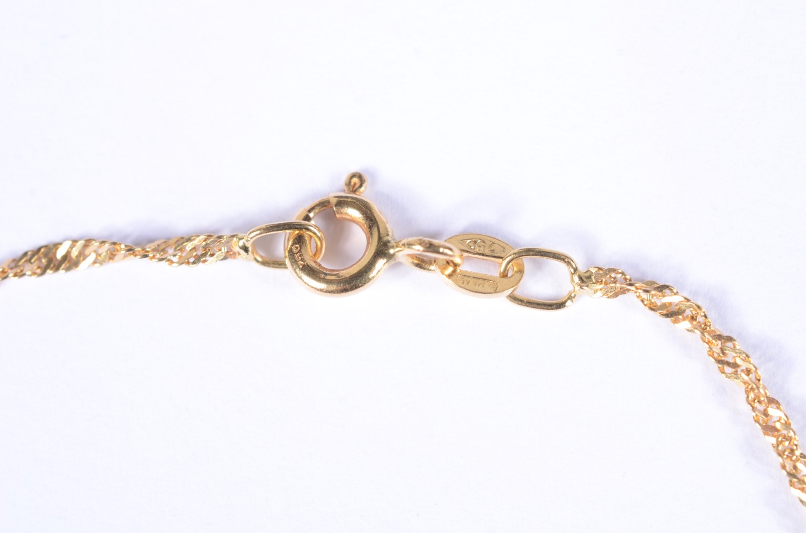 Pulseira em malha torcida de ouro 18 k., contraste 750 mls. (Por... - foto 2 de 6