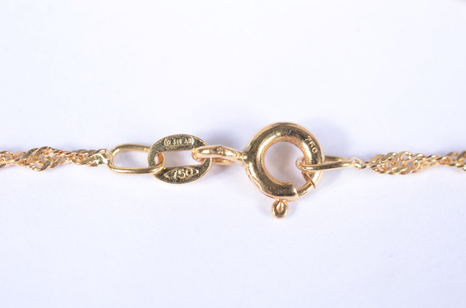 Pulseira em malha torcida de ouro 18 k., contraste 750 mls. (Por... - foto 4 de 6