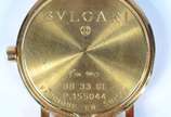 Bulgari (1884),  - Relógio masculino com caixa de ouro amarelo, modelo BB 33 GL, fundo preto, pulseira de couro castanho. Diâmetro 33 mm. (desgastes do uso)
