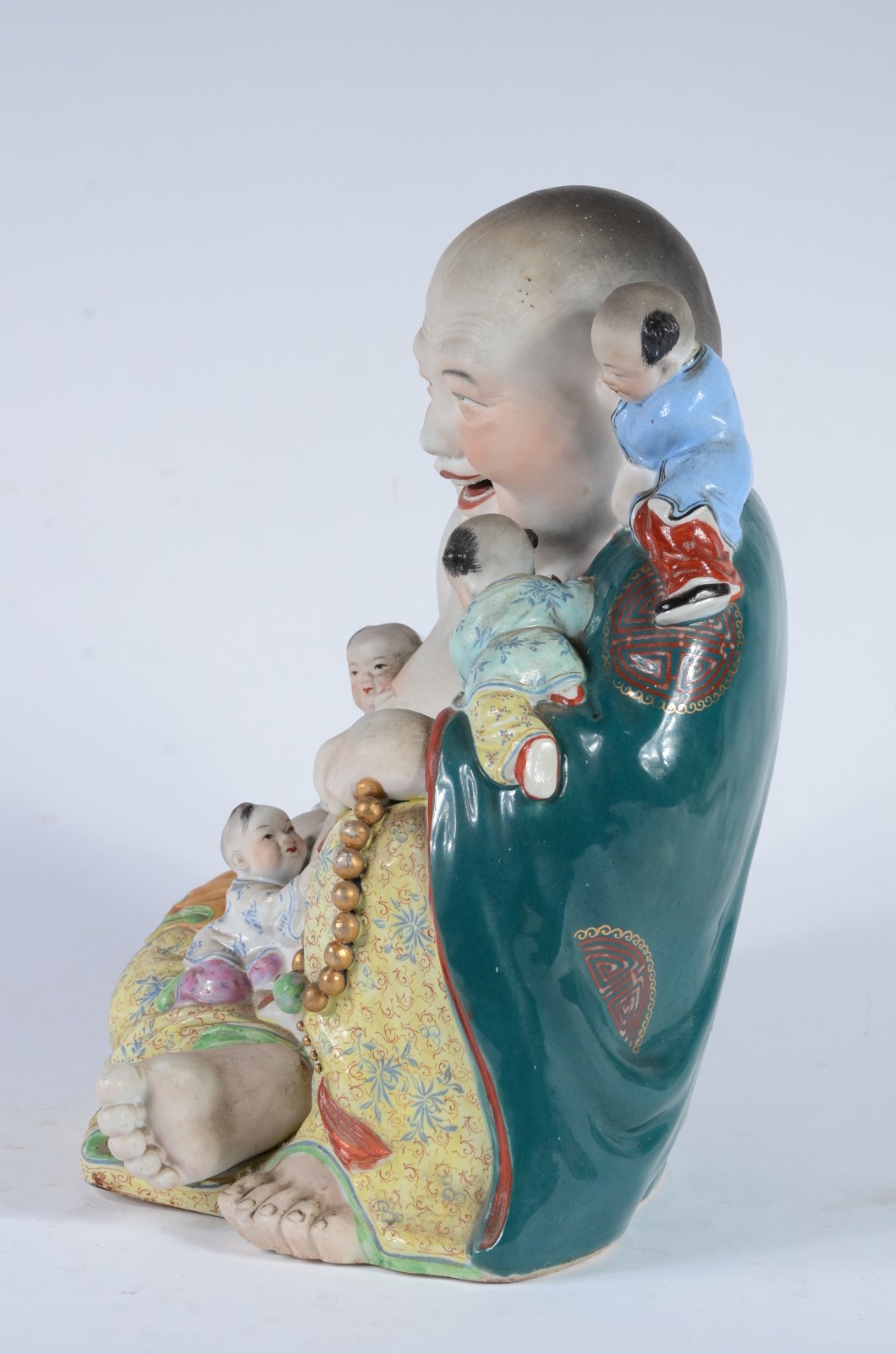 Escultura representando "Buda da fertilidade" de porcelana oriental... - foto 4 de 7
