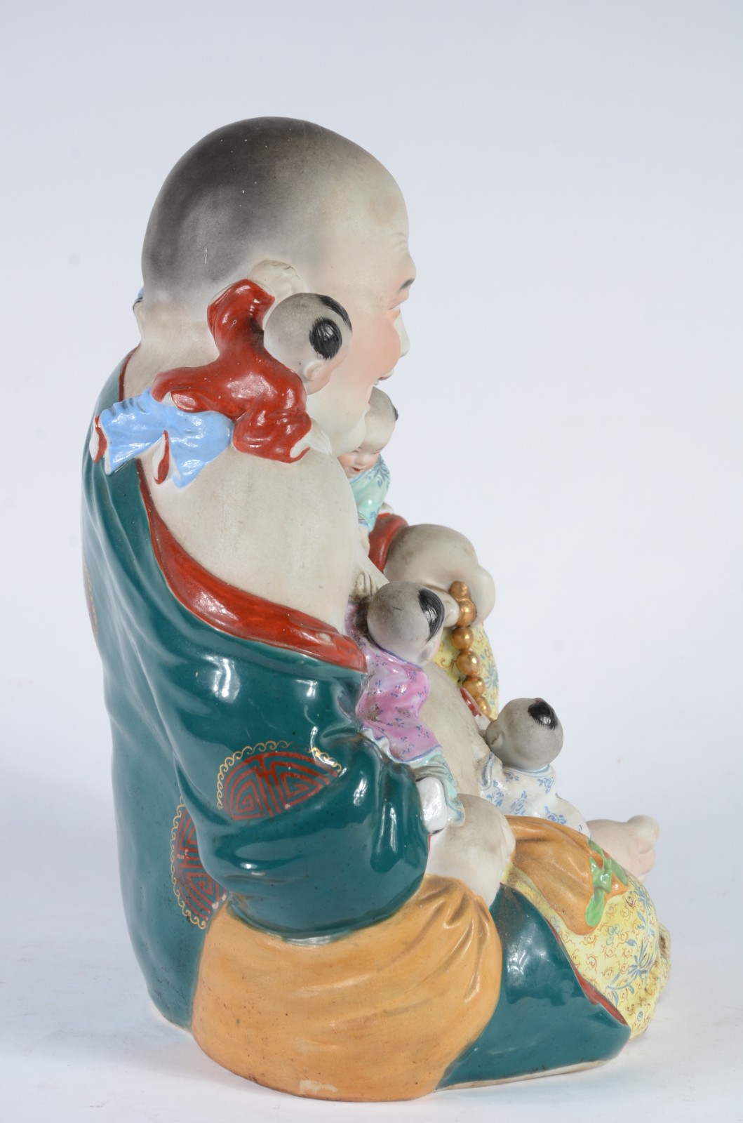 Escultura representando "Buda da fertilidade" de porcelana oriental... - foto 6 de 7