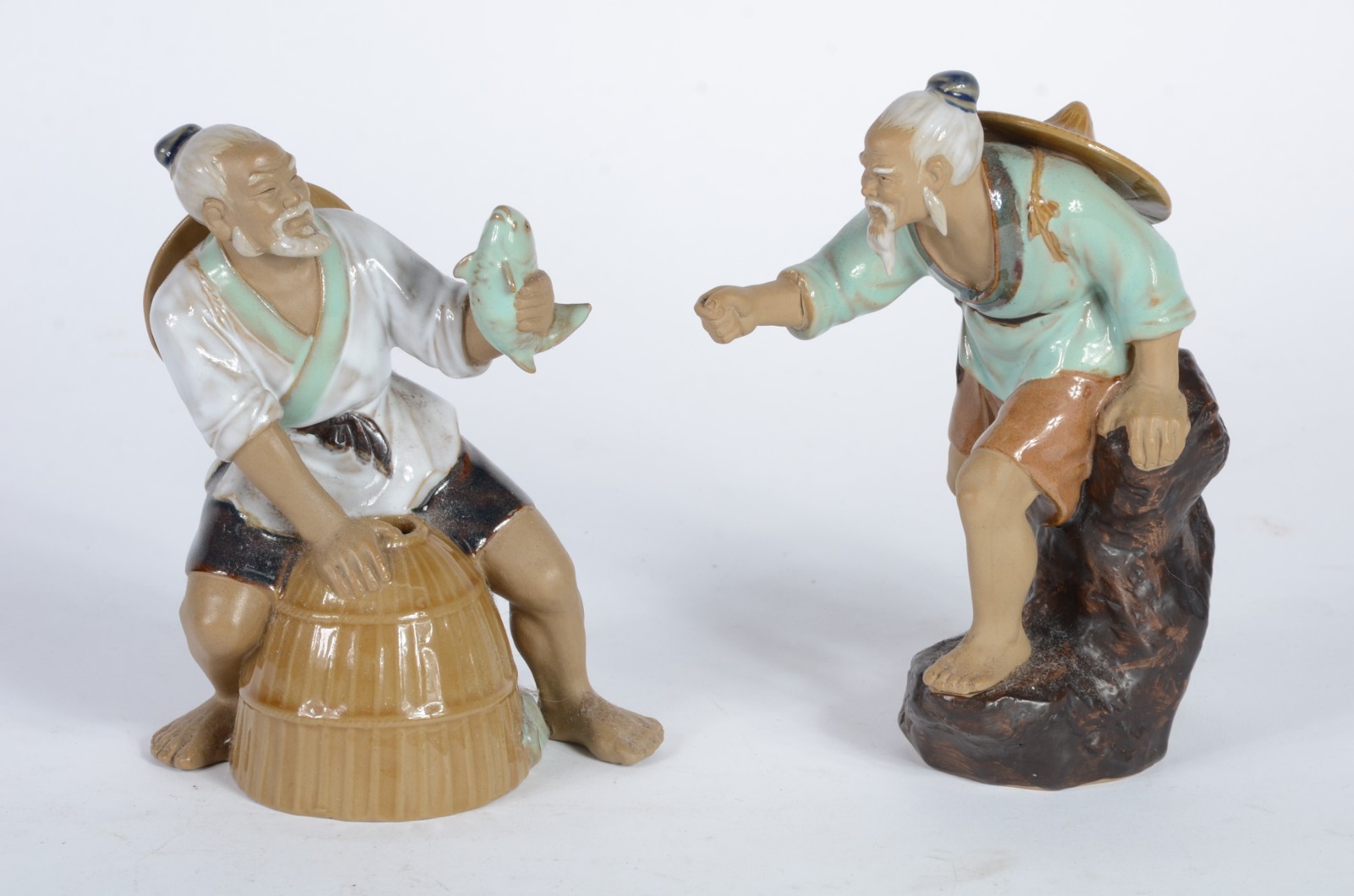 Duas esculturas de cerâmica chinesa policromad representando... - foto 1 de 6