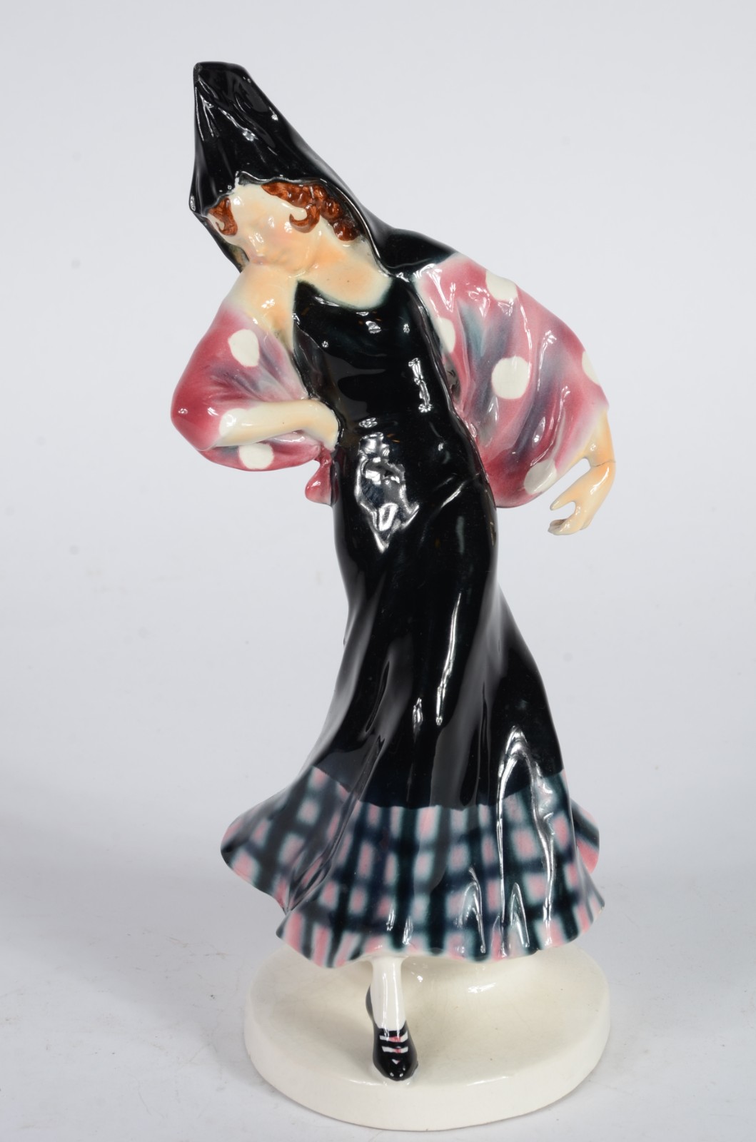 Estatueta de porcelana policromada representando dançarina. Pulso... - foto 1 de 6