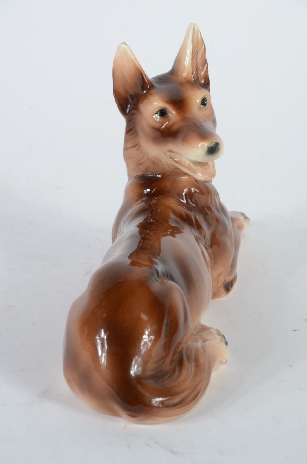 Estatueta de porcelana alemã policromada representando cachorro. - foto 4 de 7