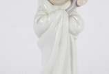 Lladró (1953),  - Escultura de porcelana espanhola policromada representando "saindo do banho".