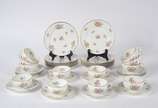 Limoges (1771),  - Conjunto para chá de porcelana francesa, Charles Ahrenfeldt, decoração floral em policromia e frisos dourados, composto de: 12 xícaras com pires e 12 