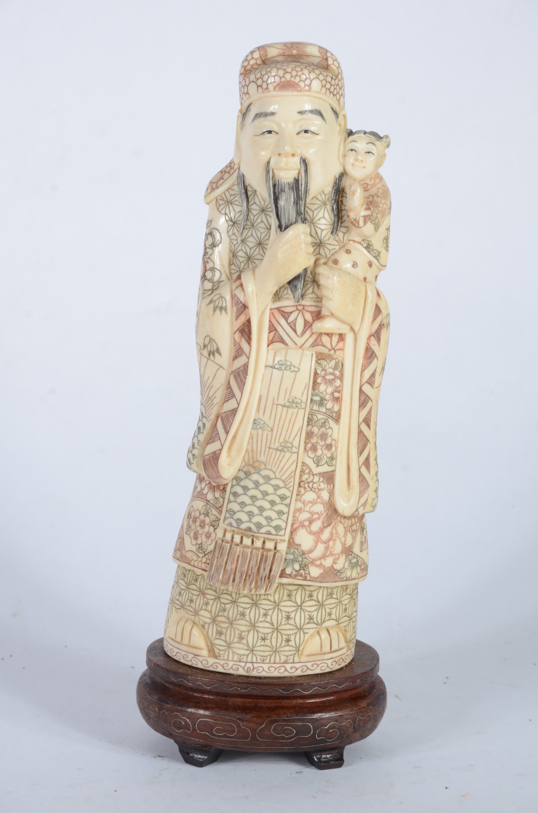 Estatueta de marfim oriental policromado representando figura... - foto 1 de 6