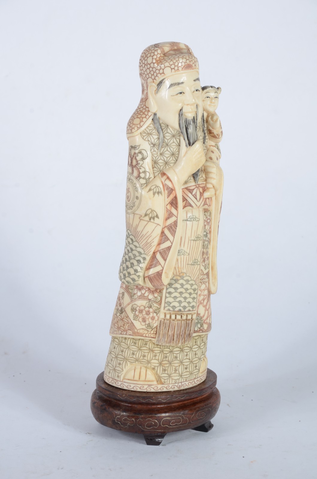 Estatueta de marfim oriental policromado representando figura... - foto 2 de 6