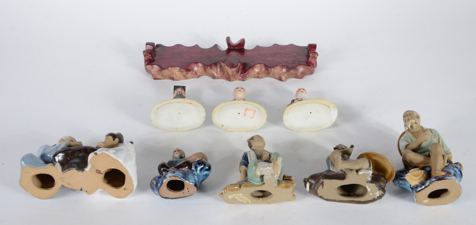Conjunto com 8 estatuetas diversas de cerâmica oriental policromada. - foto 9 de 10