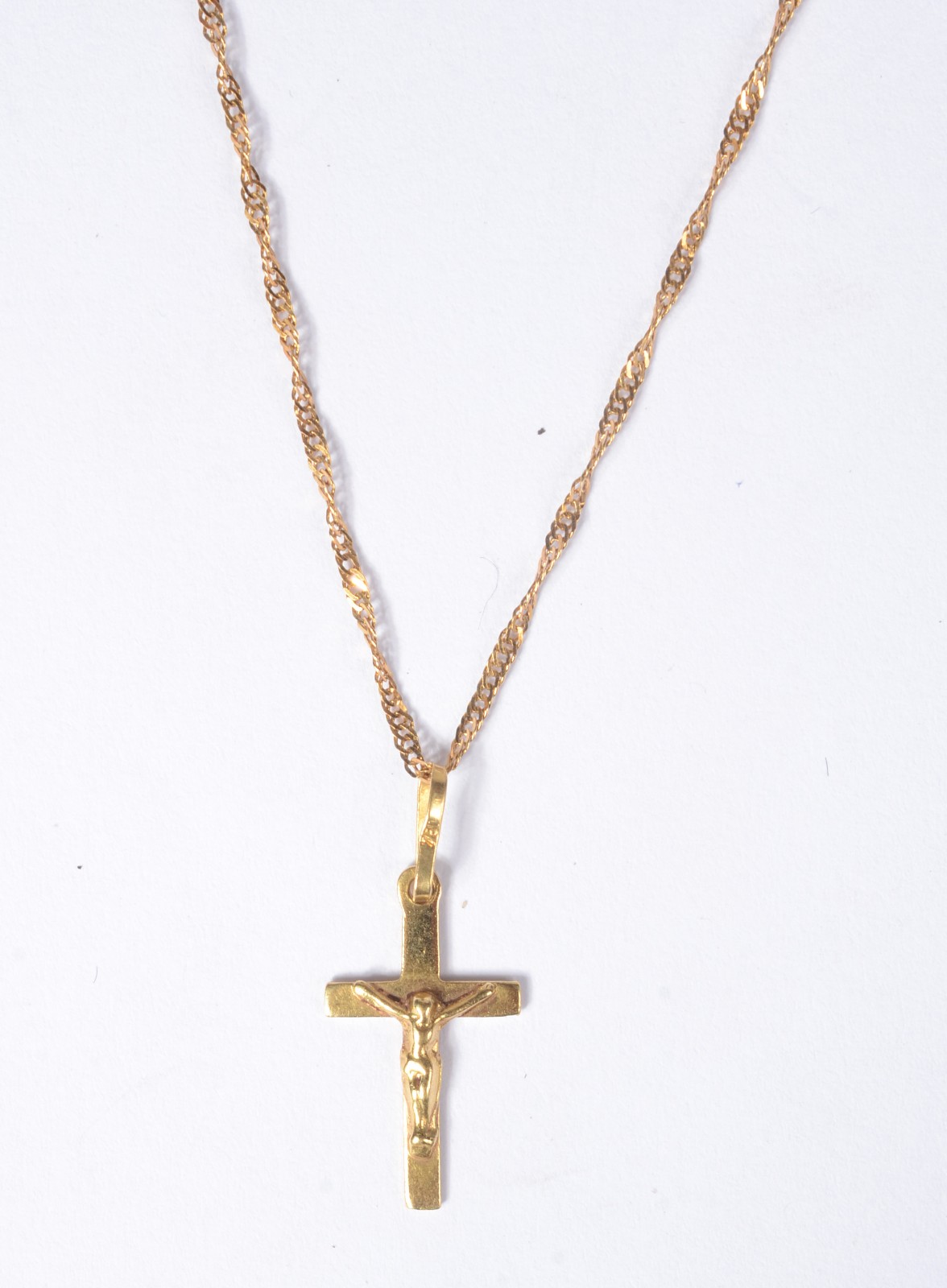 Colar com crucifixo de ouro 18 k., contraste 750 mls. (Por motivos de... - foto 1 de 6
