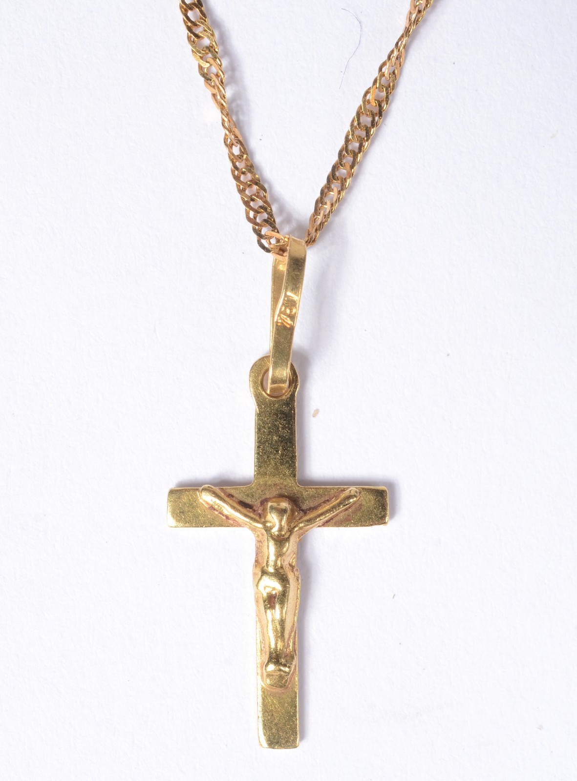 Colar com crucifixo de ouro 18 k., contraste 750 mls. (Por motivos de... - foto 3 de 6