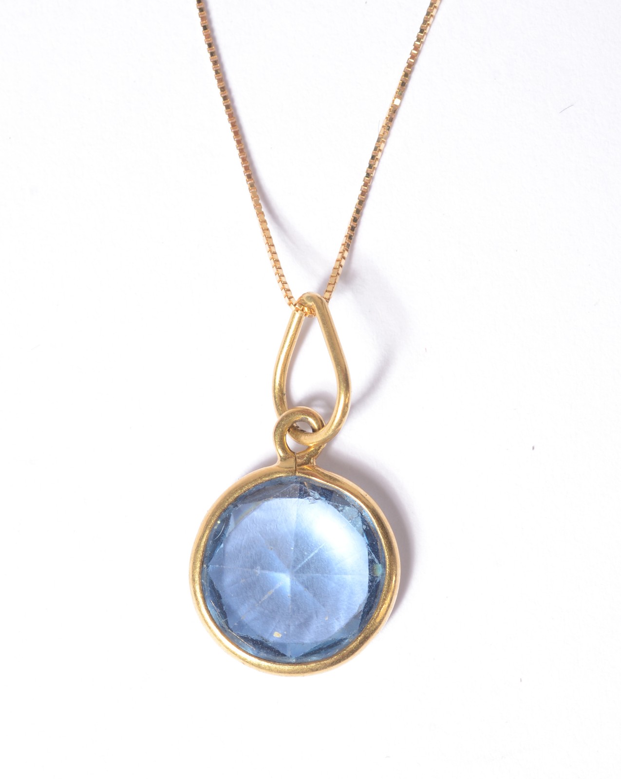 Colar de ouro 18 k., contraste 750 mls com topázio azul. (Por motivos... - foto 3 de 7