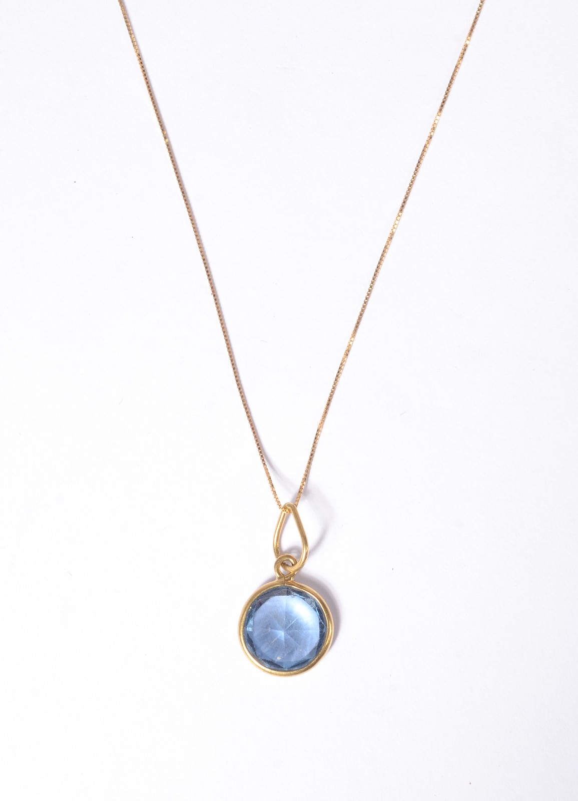Colar de ouro 18 k., contraste 750 mls com topázio azul. (Por motivos... - foto 1 de 7