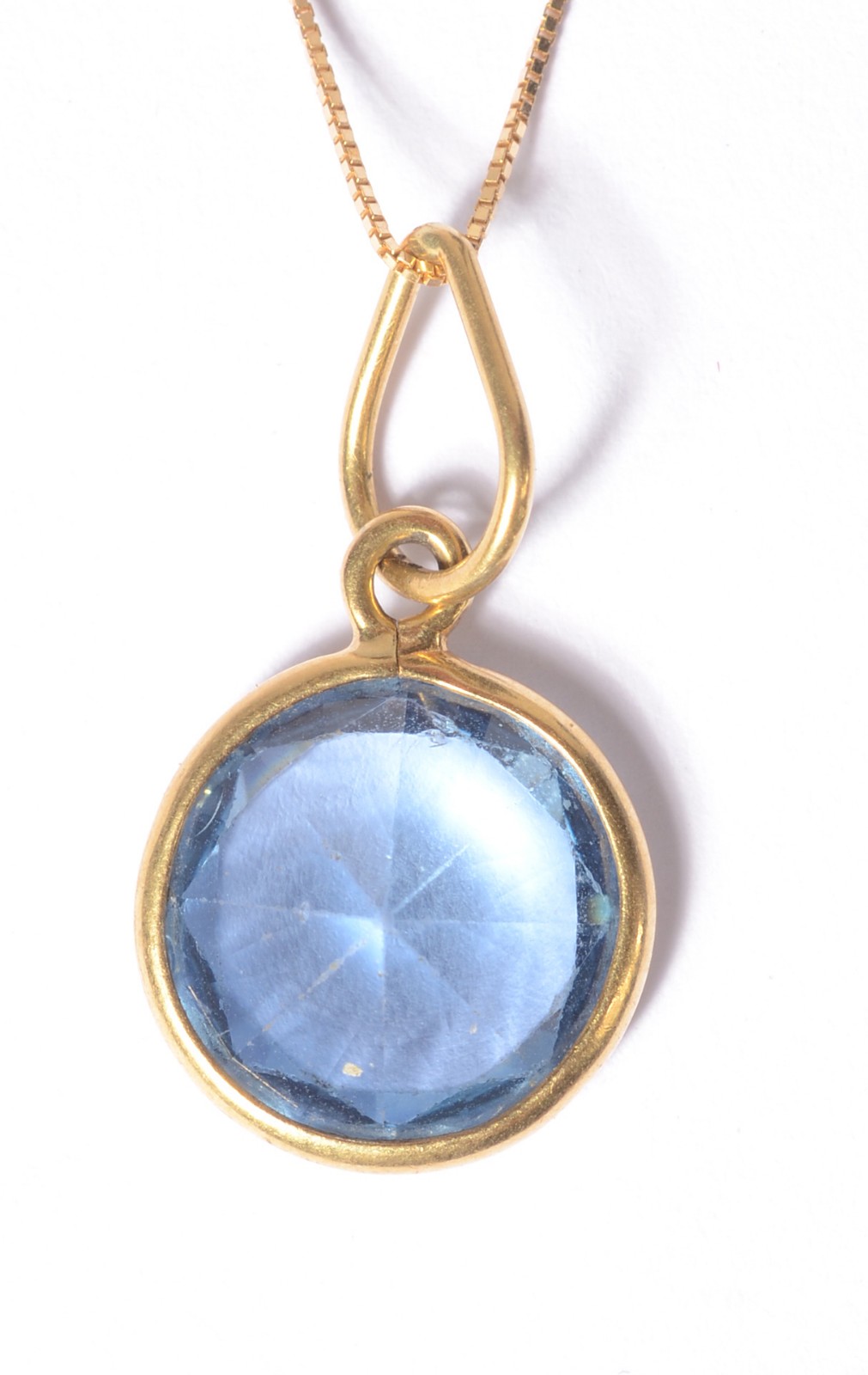 Colar de ouro 18 k., contraste 750 mls com topázio azul. (Por motivos... - foto 5 de 7