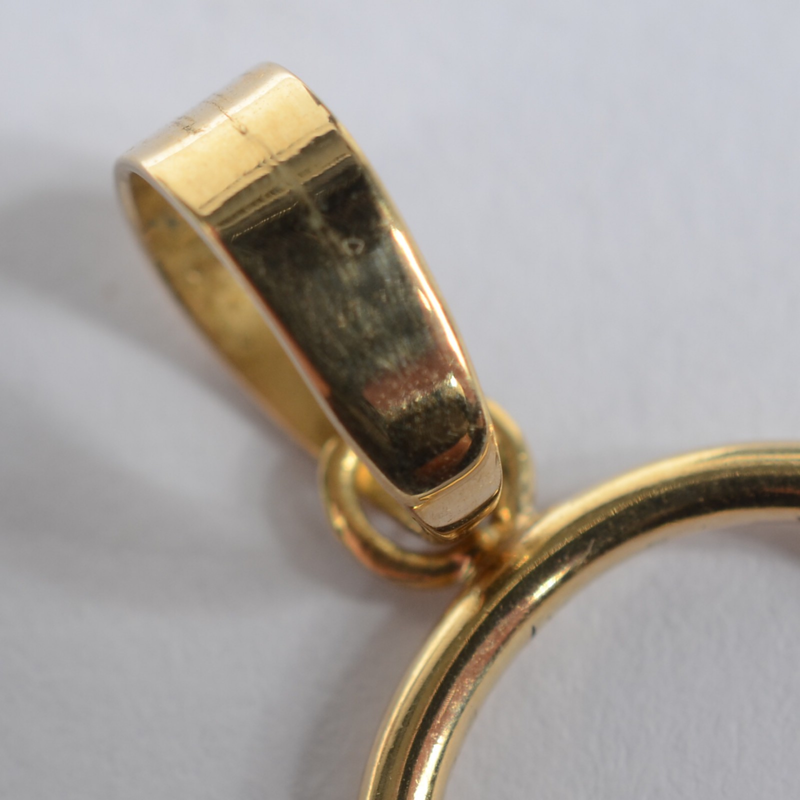 Pendente na forma de coração de ouro 18 k., contraste 750 mls. (Por... - foto 3 de 3