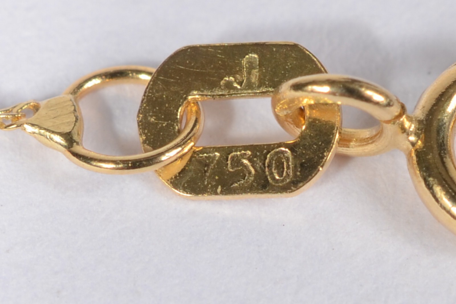 Colar com pendente com uma perola de ouro 18 k., contraste 750 mls... - foto 6 de 7