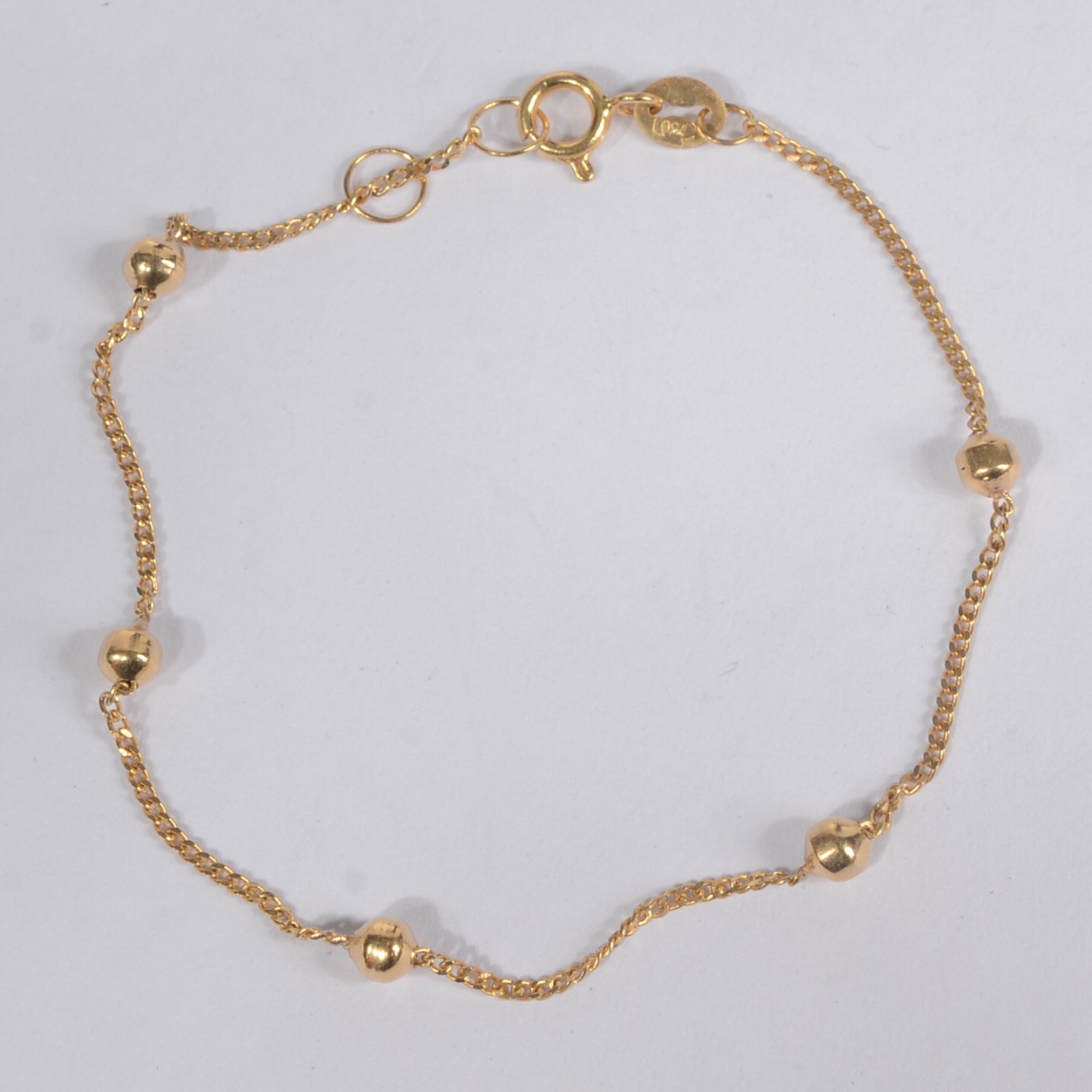 Pulseira de criança de ouro 18 k. (Por motivos de segurança a peça... - foto 2 de 3