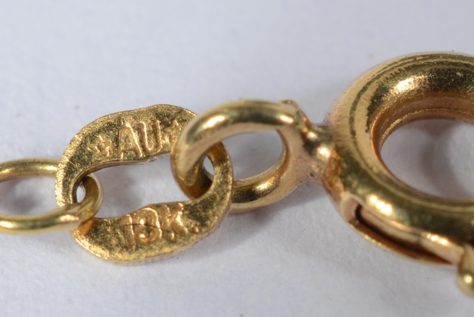 Colar com pendente na forma de "ramo" com flor de ouro 18 k. (Por... - foto 5 de 6
