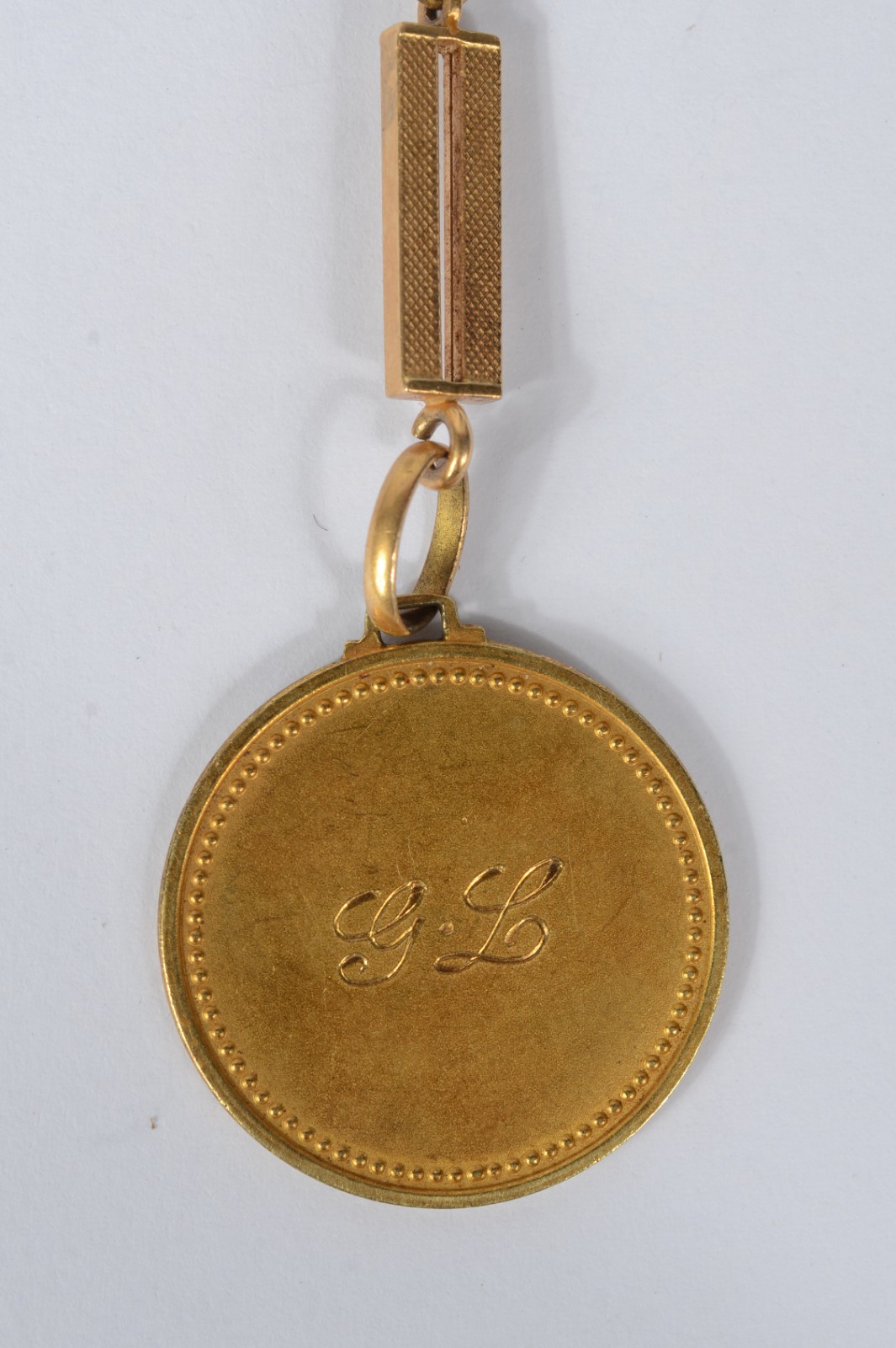 Chaveiro com medalha de ouro 18k., contraste 750 mls. (Por motivos de... - foto 1 de 6