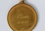 Chaveiro com medalha de ouro 18k., contraste 75... - Chaveiro com medalha de ouro 18k., contraste 750 mls. (Por motivos de segurança a peça não se encontra na loja).