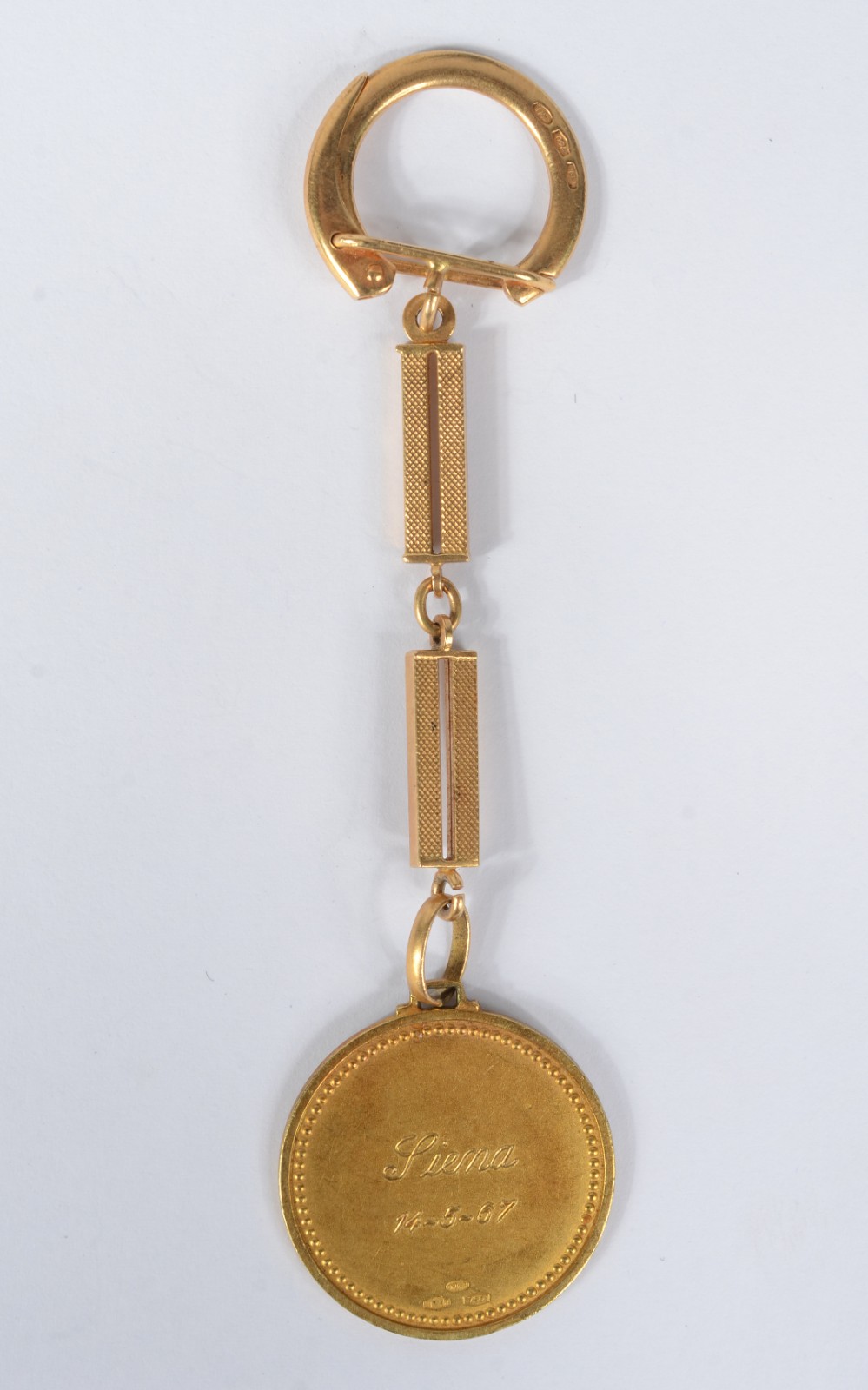 Chaveiro com medalha de ouro 18k., contraste 750 mls. (Por motivos de... - foto 4 de 6
