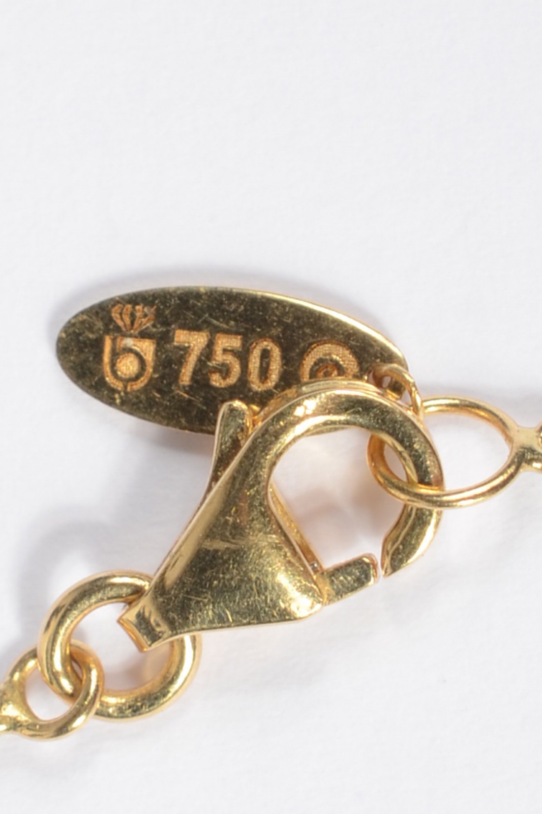 Pulseira de ouro 18 k., contraste 750 mls com penduricalhos. (Por... - foto 4 de 4