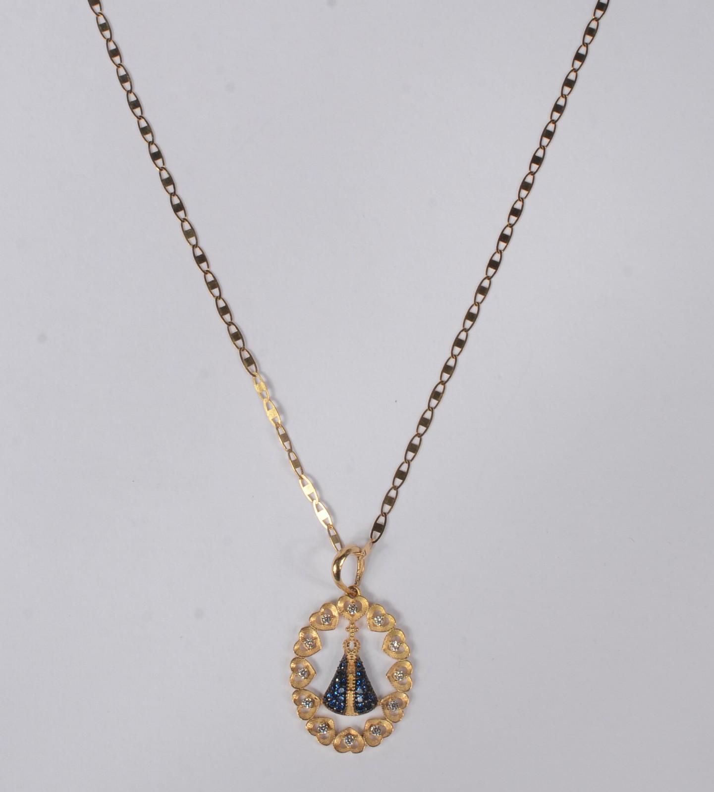 Colar com pendente com manto azul de ouro 18 k., contraste 750 mls... - foto 1 de 6