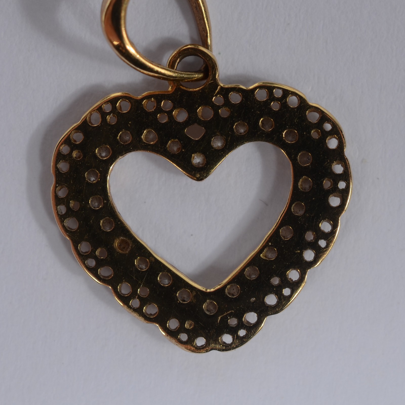 Colar com pendente na forma de coração com safiras de ouro 18 k. (Por... - foto 5 de 6