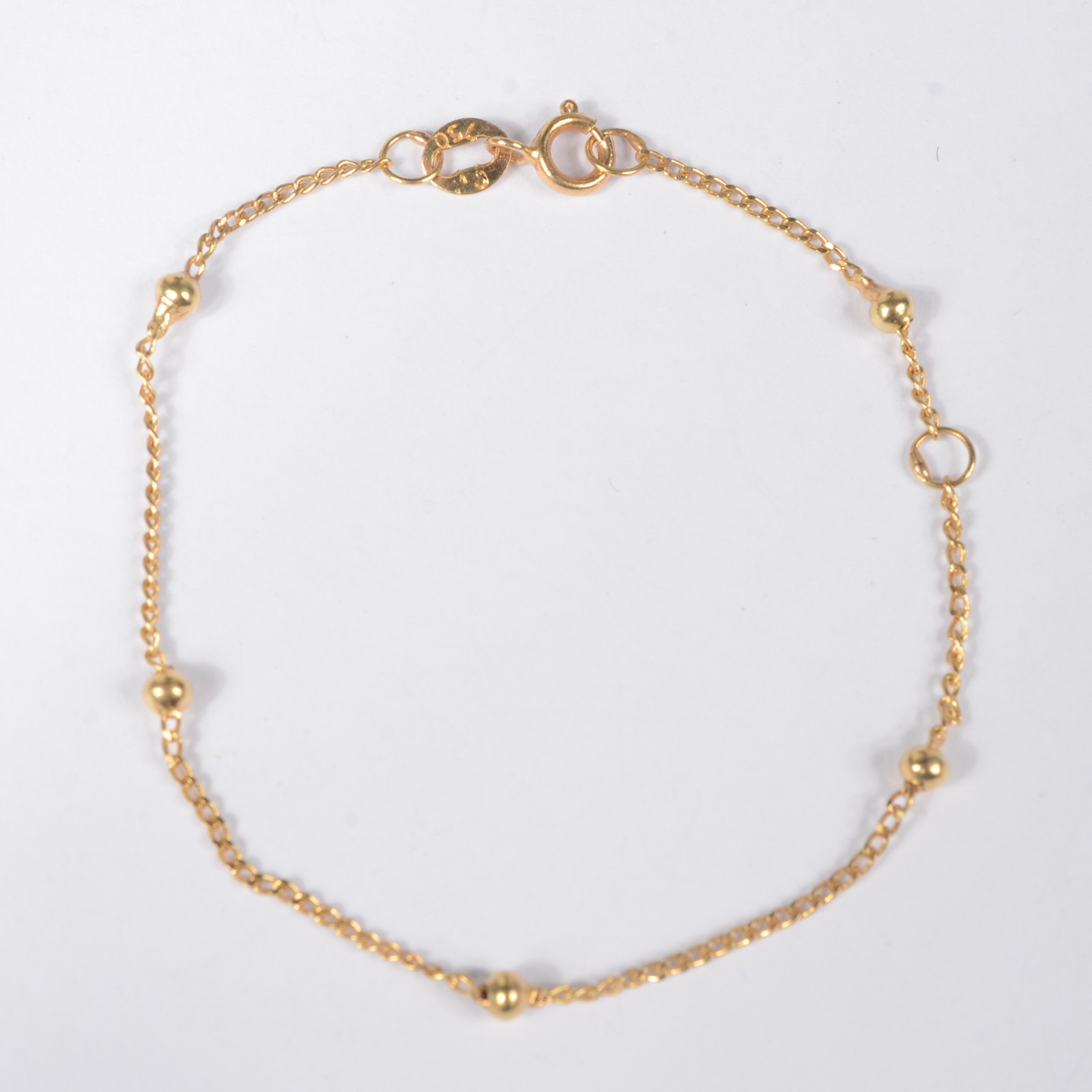 Pulseira de ouro 18 k., contraste 750 mls com bolinhas. (Por motivos... - foto 2 de 3