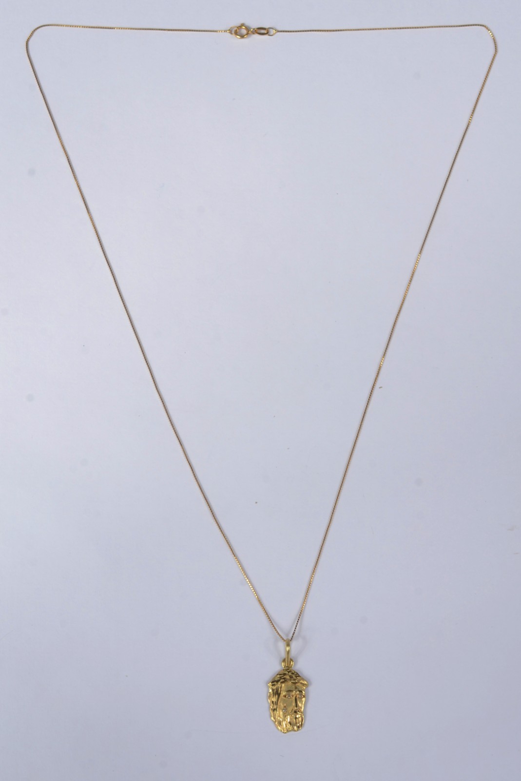 Colar com pendente com rosto de "Cristo" de ouro 18 k., contraste 750... - foto 2 de 5