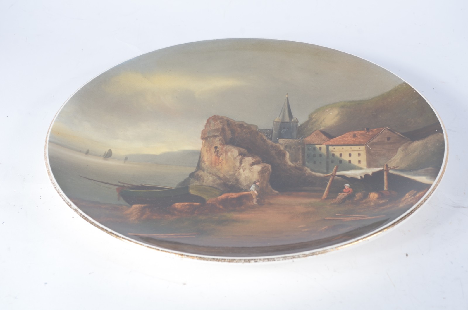 Medalhão de faiança alemã decorado com cena de castelo em encosta com... - foto 2 de 5