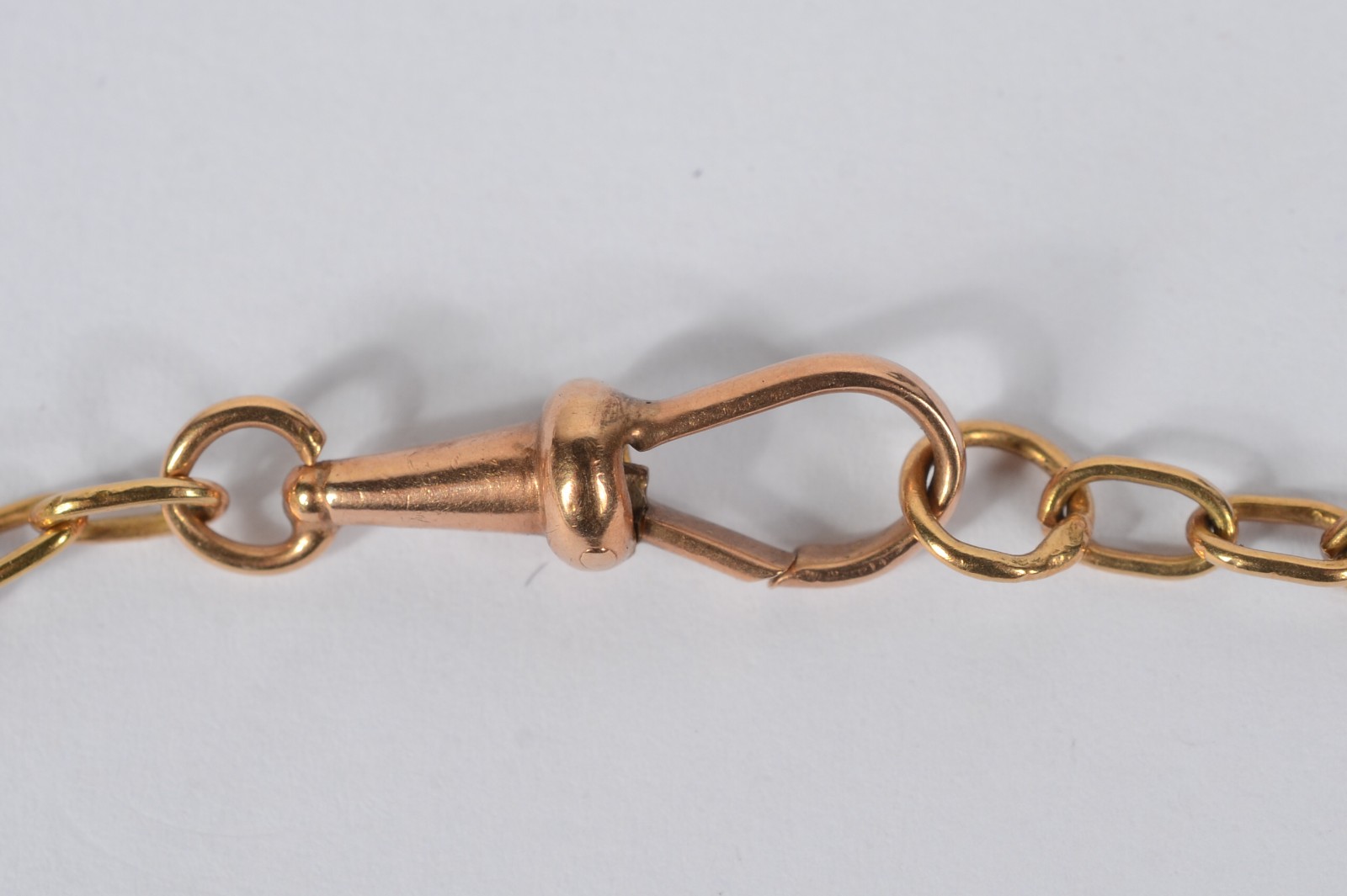 Conjunto com 3 "chateleines" (correntes de relógio de bolso) em ouro... - foto 2 de 4