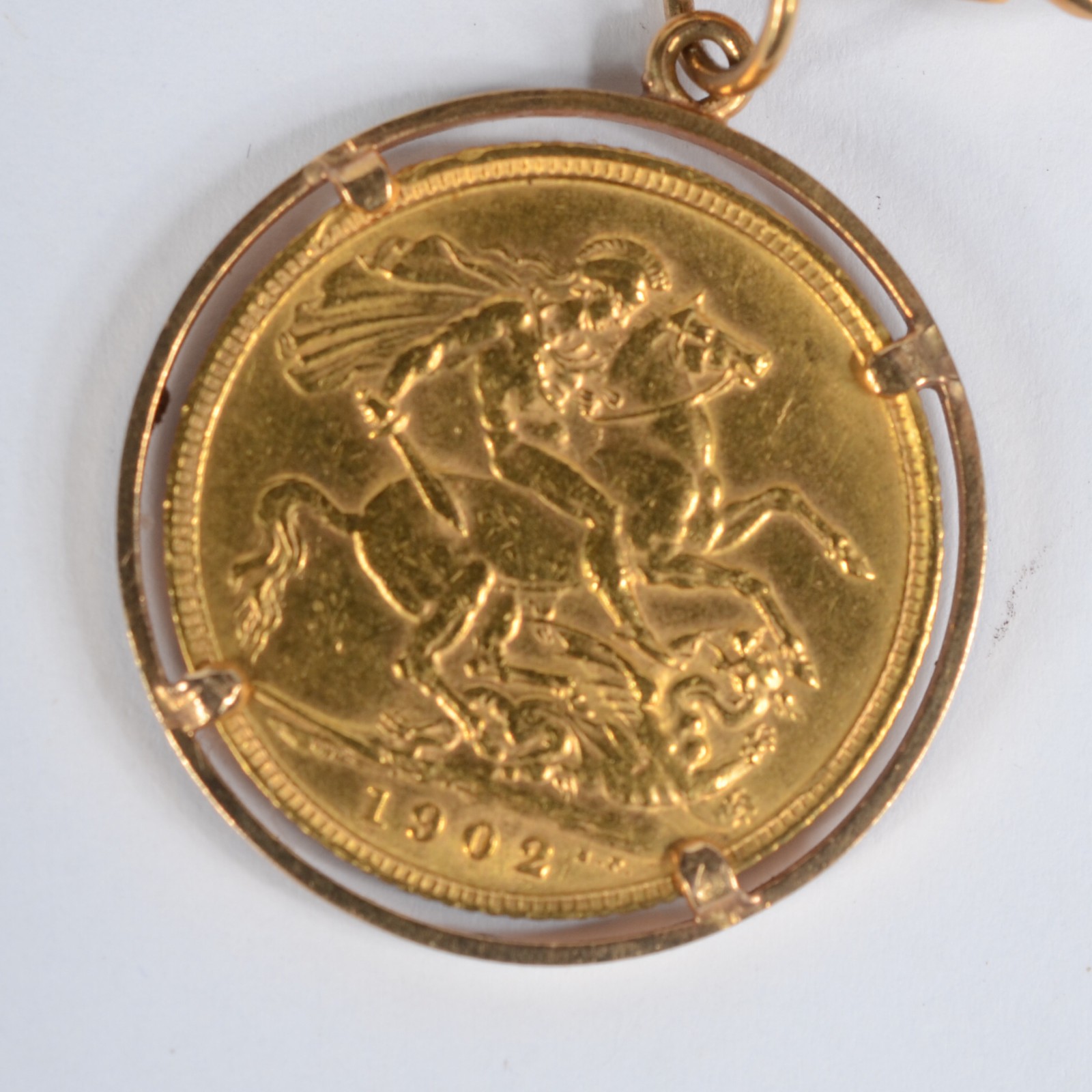 Pulseira de ouro 18k feitio drumete com pingentes de libra. Peso... - foto 5 de 7