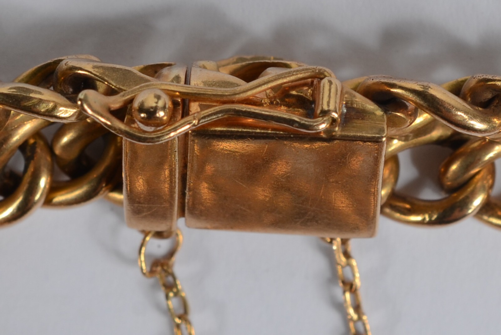Pulseira de ouro 18k feitio drumete com pingentes de libra. Peso... - foto 7 de 7