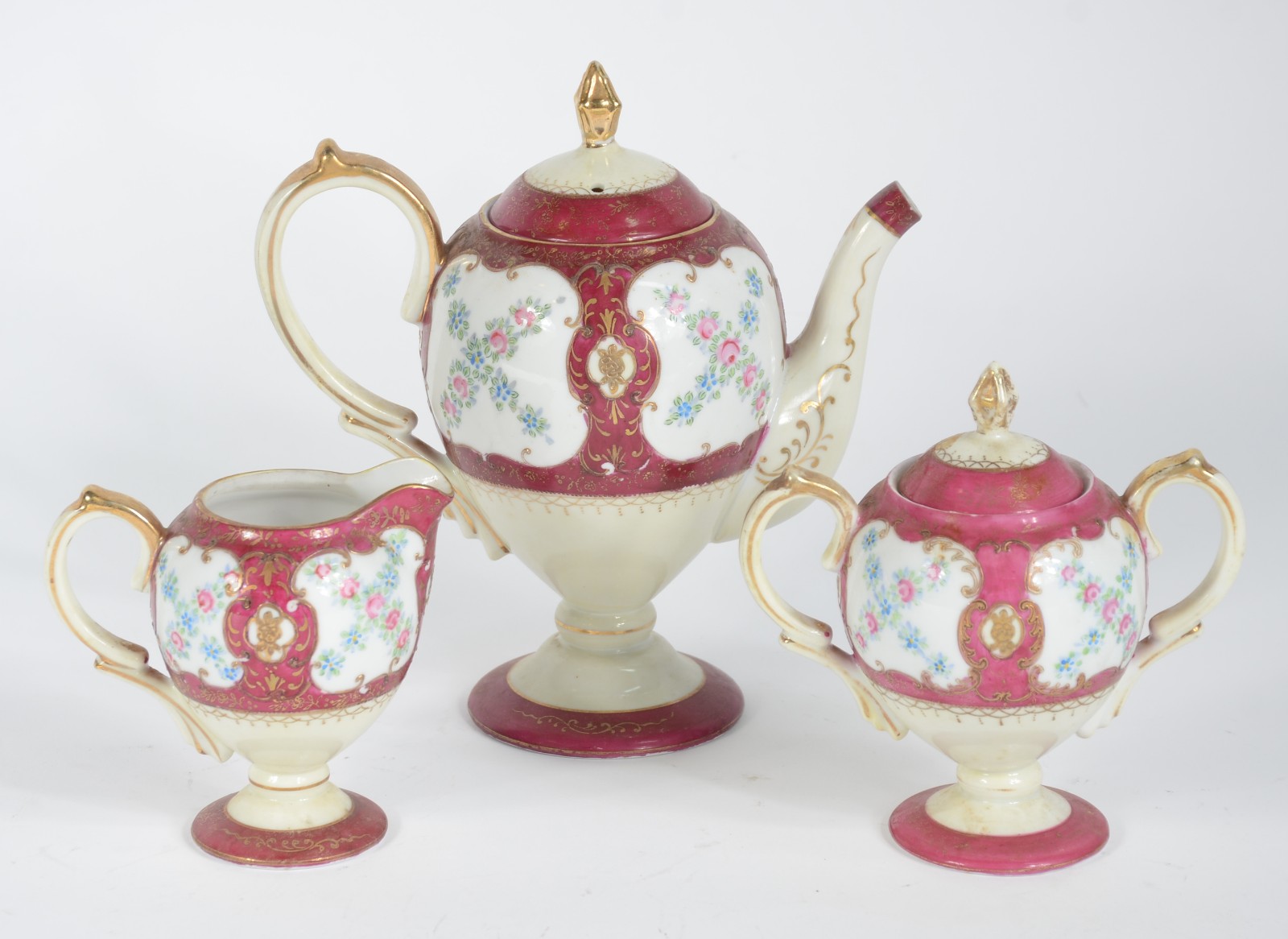 Lote com 12 peças diversas de porcelana, sendo 5 bules, 2 leiteiras... - foto 3 de 11