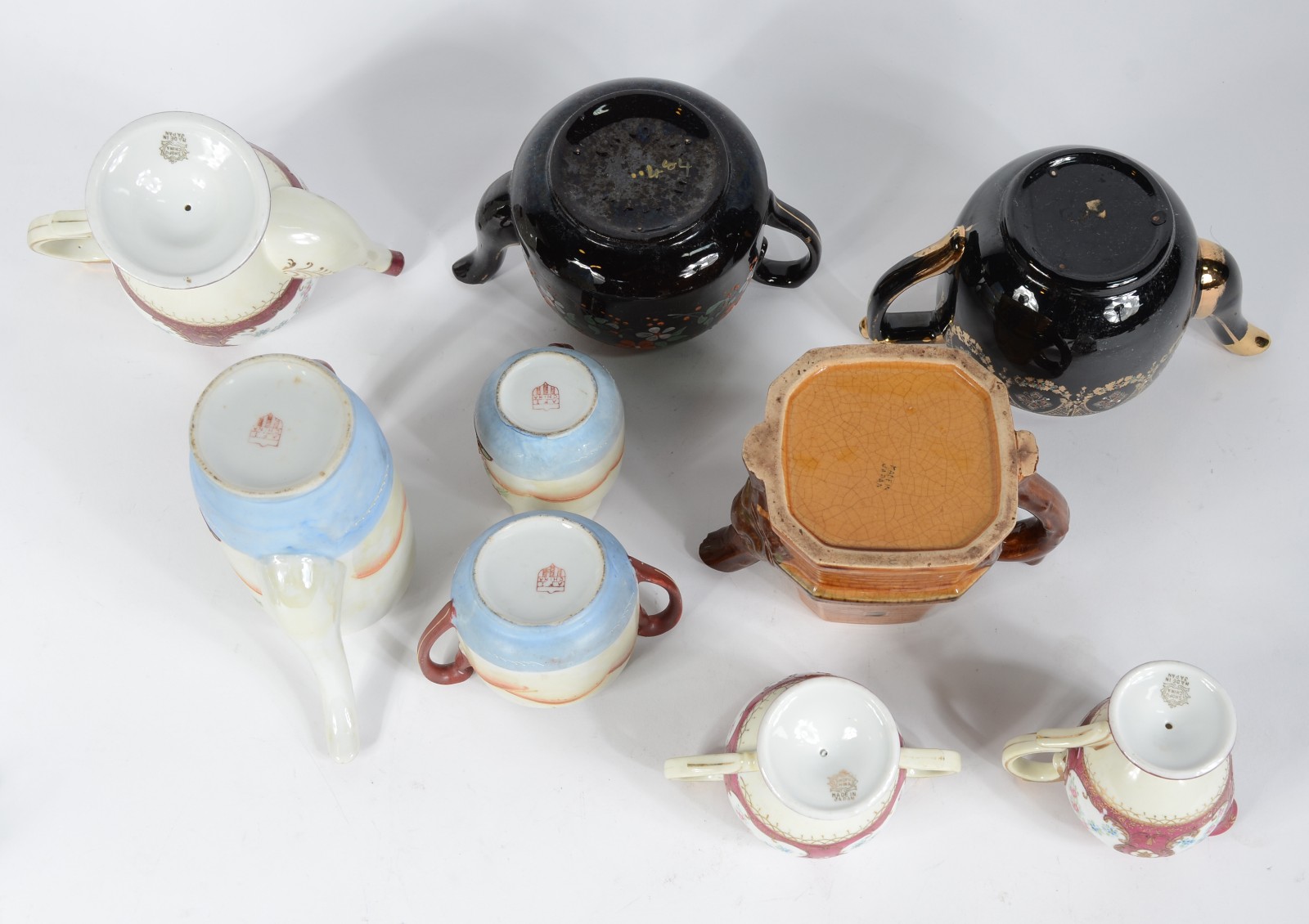 Lote com 12 peças diversas de porcelana, sendo 5 bules, 2 leiteiras... - foto 11 de 11