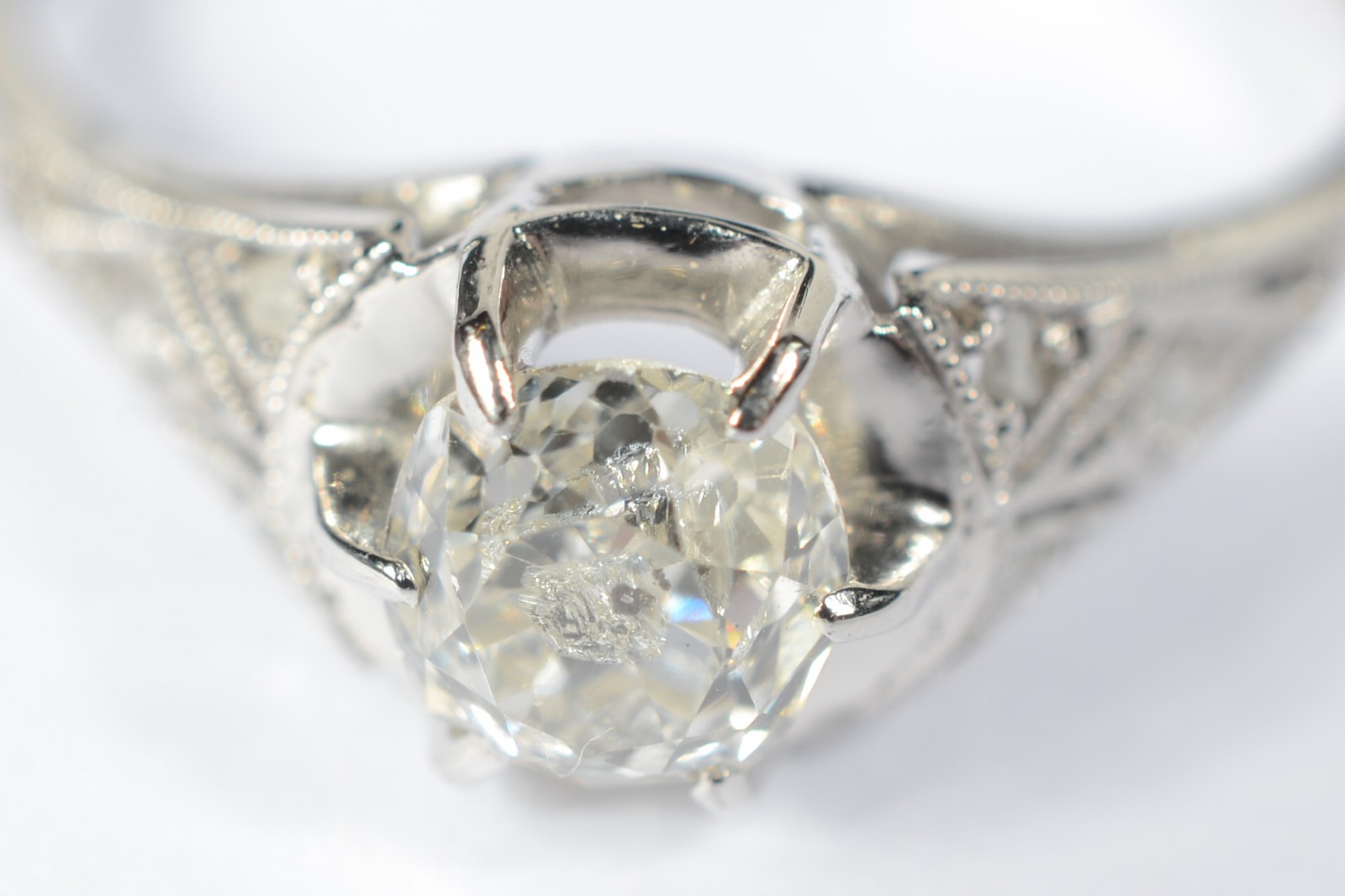 Antigo solitário de ouro branco de 0,40ct, aro 17. (Por motivos de... - foto 3 de 6