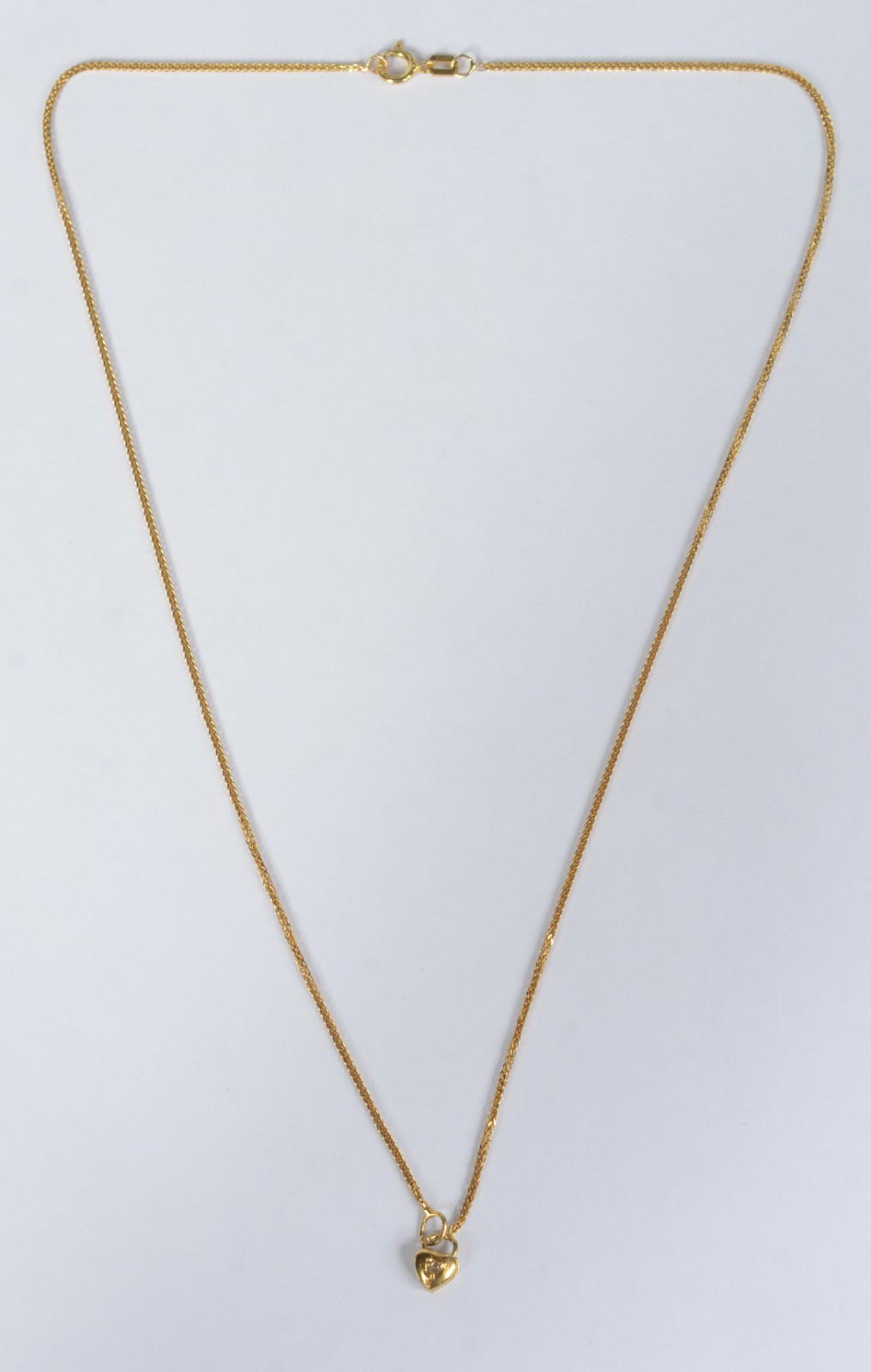 Colar de ouro amarelo 750 com mini pendente no feitio de coração... - foto 2 de 6